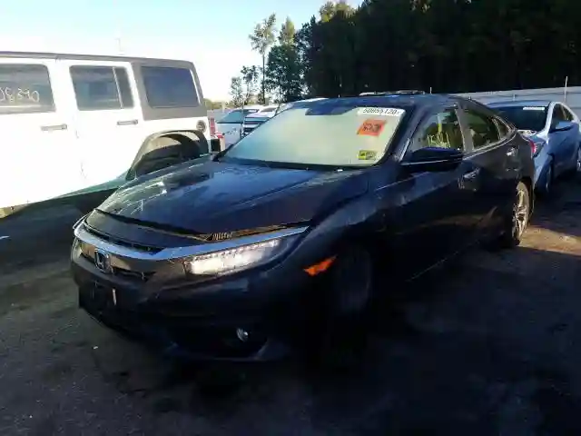 JHMFC1F95JX008969 2018 HONDA CIVIC TOURING-1