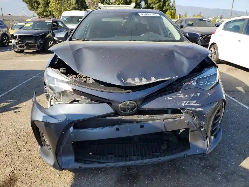 5YFBURHEXJP758565 2018 TOYOTA COROLLA-4