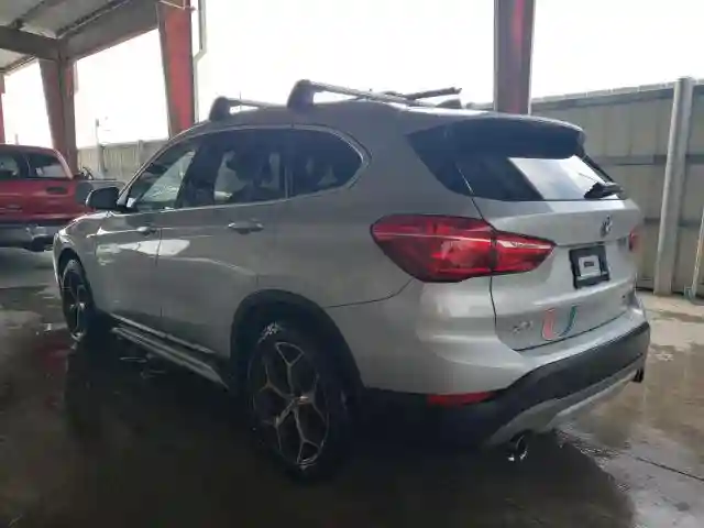 WBXHU7C37J5L09283 2018 BMW X1-1