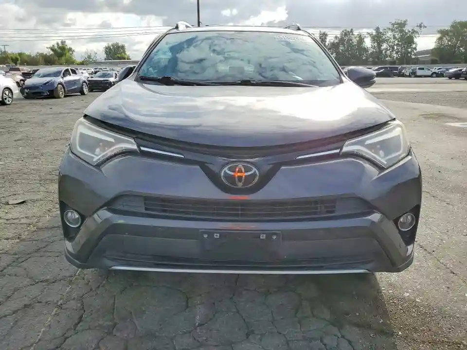 2T3YFREV1GW308990 2016 TOYOTA RAV4-4