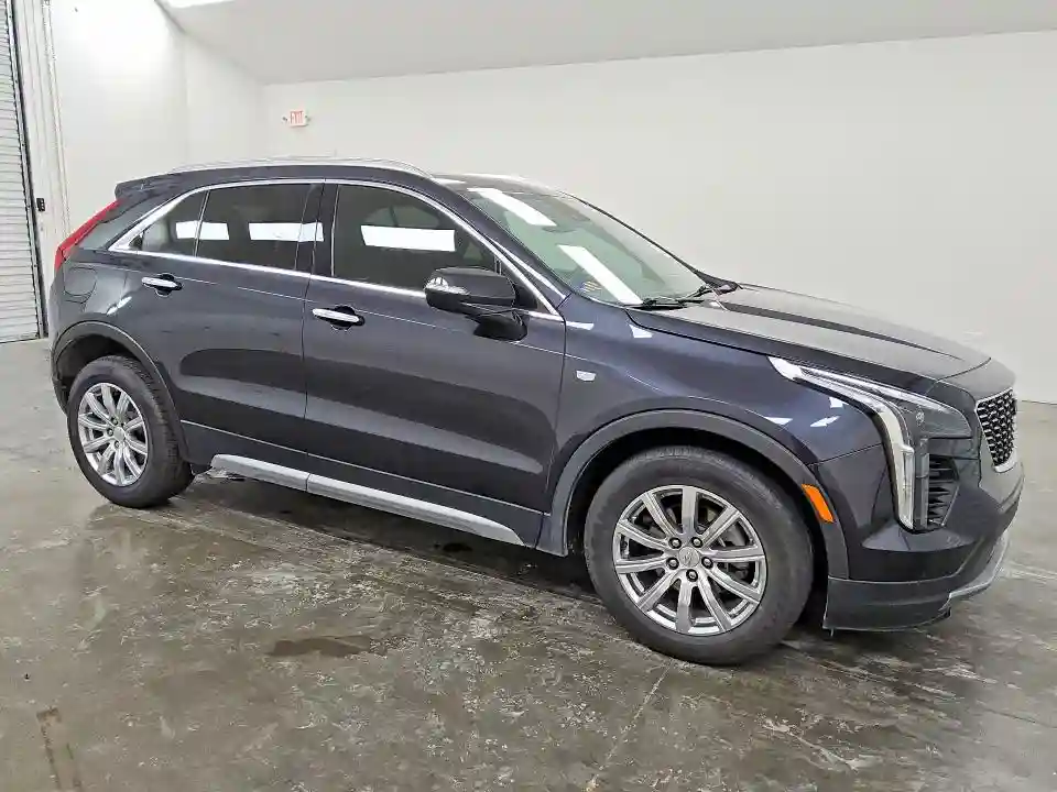 1GYFZCR49PF100994 2023 CADILLAC XT4-3