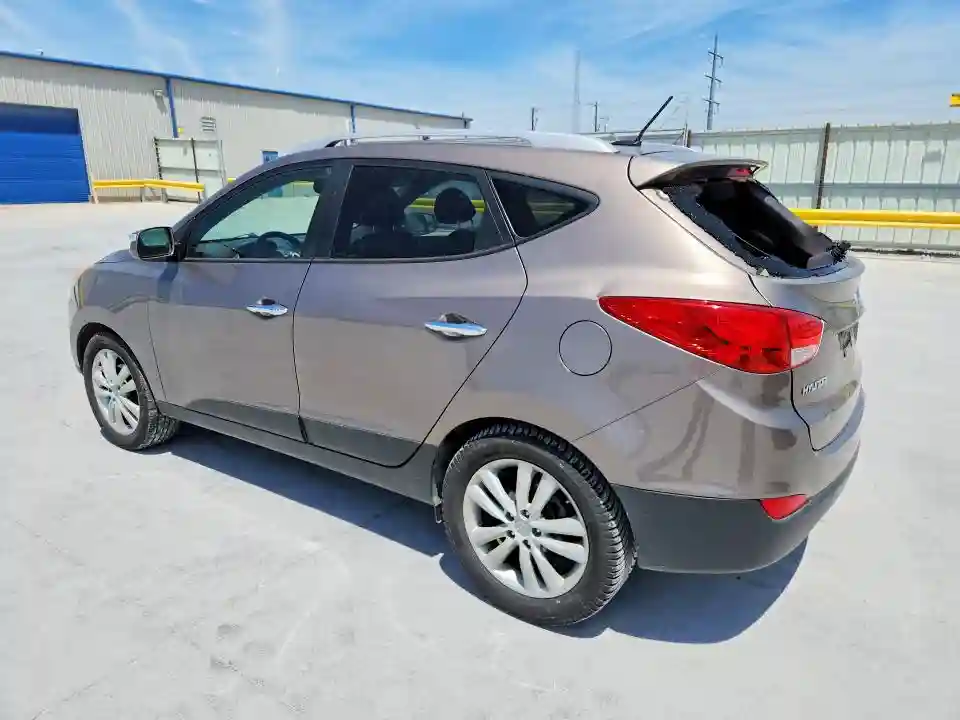 KM8JU3AC9DU701178 2013 HYUNDAI TUCSON-1