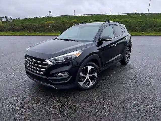 KM8J3CA25GU130626 2016 HYUNDAI TUCSON-1