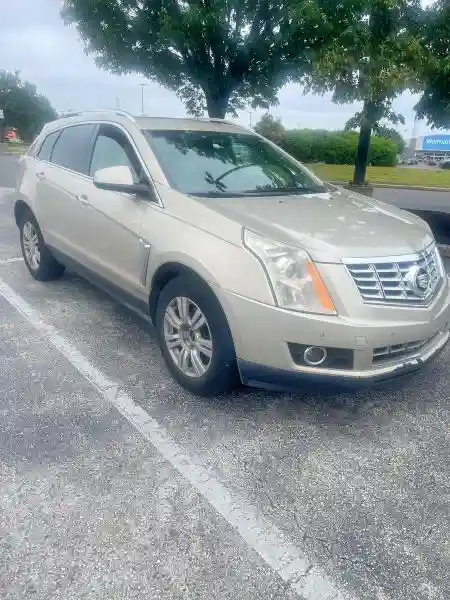 3GYFNBE33FS623988 2015 CADILLAC SRX-0