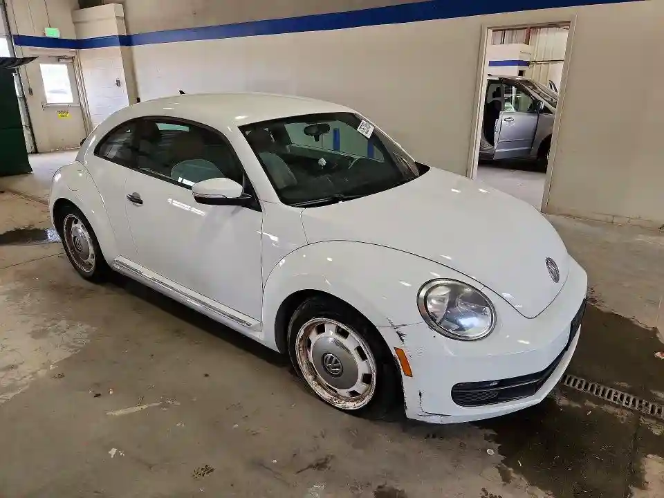 3VWF17ATXGM637104 2016 VOLKSWAGEN BEETLE-3