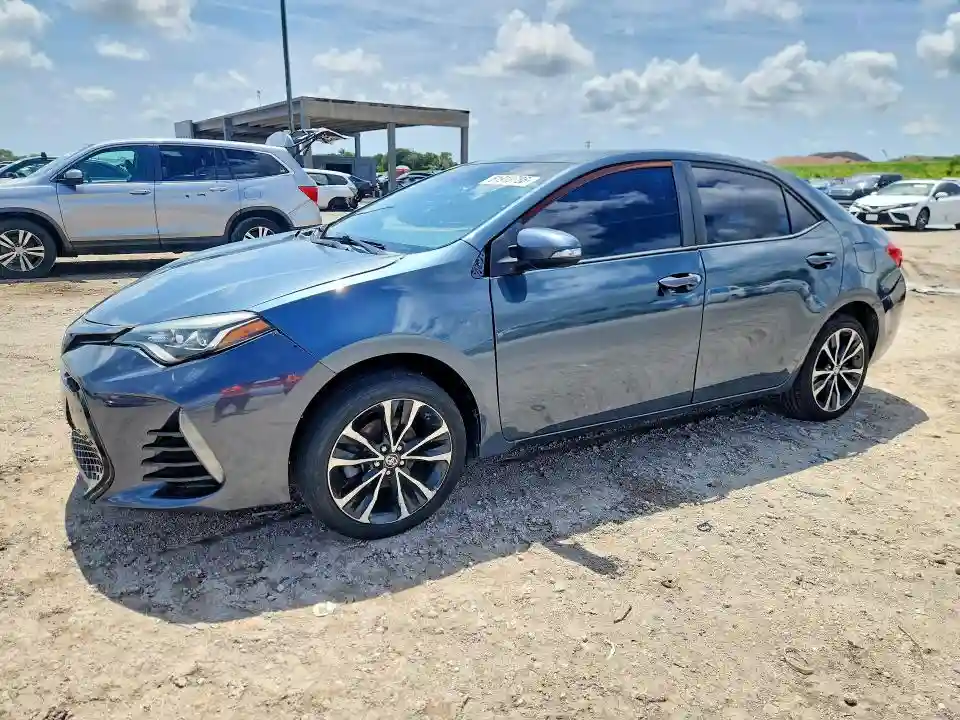 5YFBURHE6JP821676 2018 TOYOTA COROLLA-0