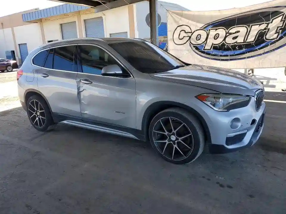 WBXHT3C30G5E56309 2016 BMW X1-3