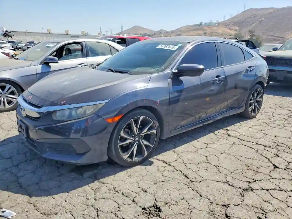 2HGFC2F79JH556243 2018 HONDA CIVIC-0