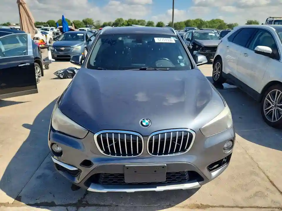 WBXHU7C30J5L09402 2018 BMW X1-4