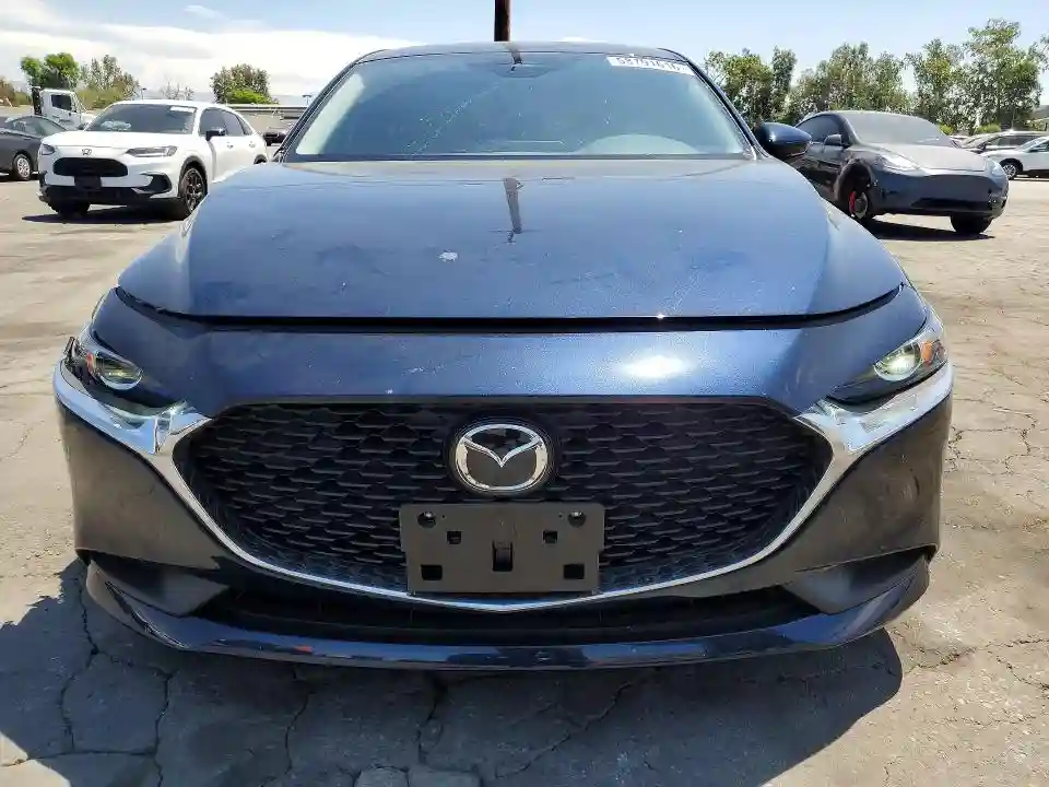 JM1BPAAL2T1878899 2026 MAZDA 3-4