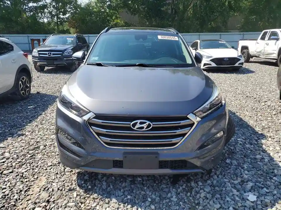 KM8J3CA20GU239558 2016 HYUNDAI TUCSON-4