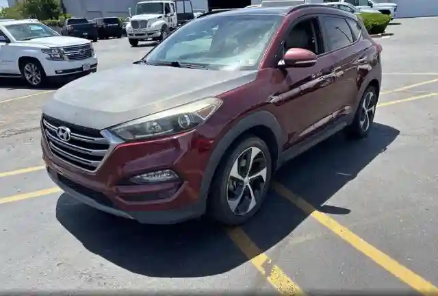 KM8J3CA22GU079540 2016 HYUNDAI TUCSON-1